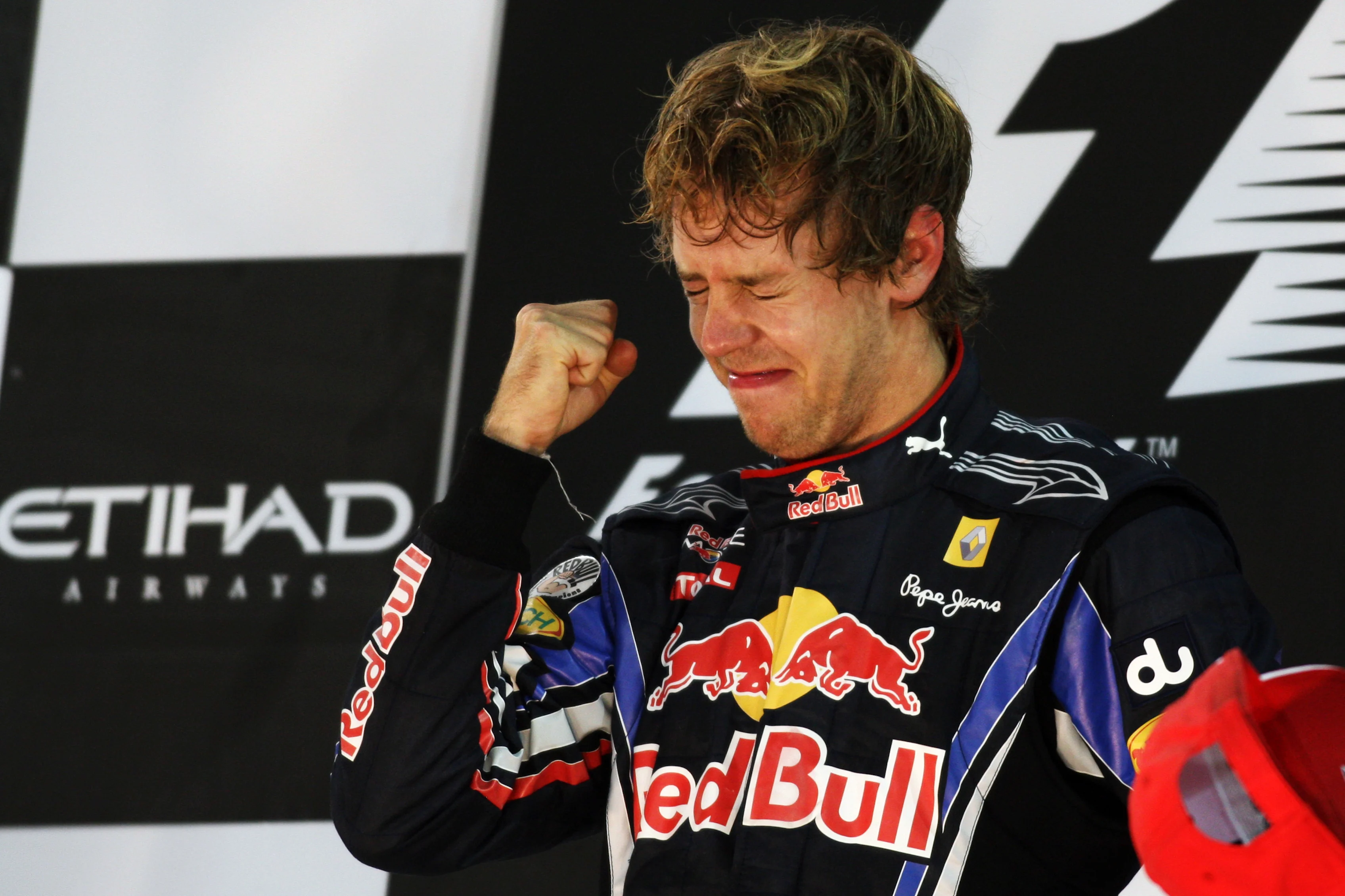Race winner and 2010 Champion Sebastian Vettel (GER) Red Bull Racing celebrates on the